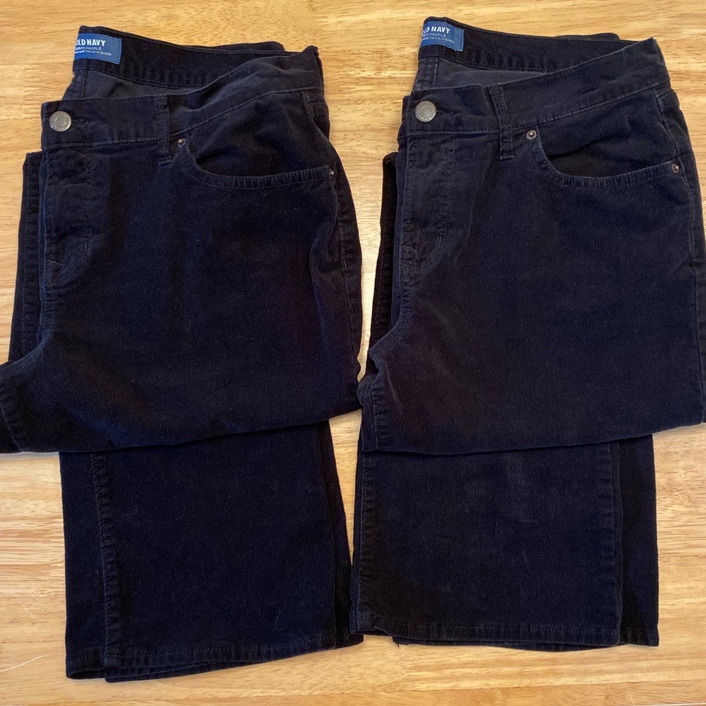 TWO pairs of black fine wale corduroys, size 12